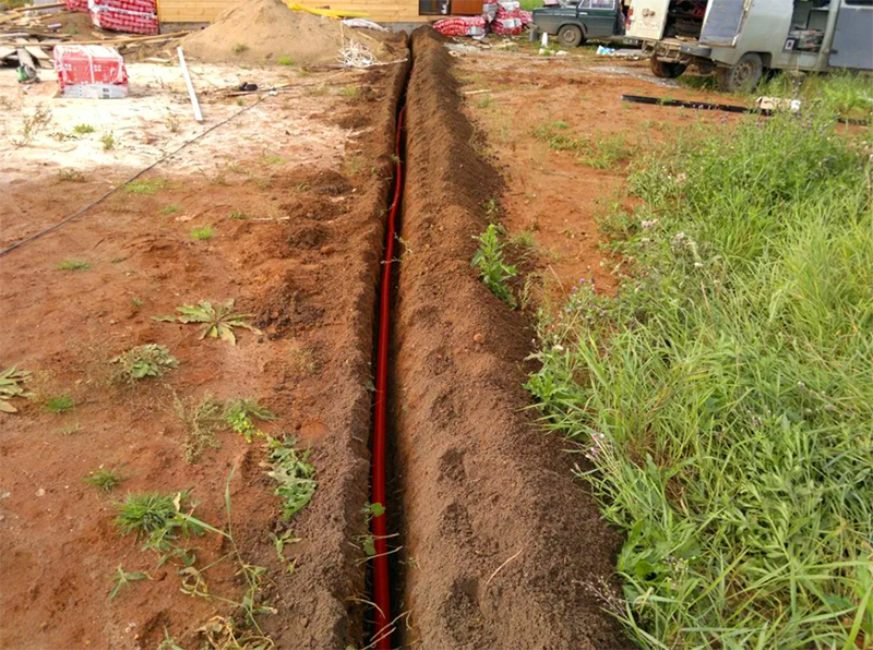 You can bring the cable through the air or in a trench. The trench makes sense if you understand that the structure will stand for a long time and then be used for different purposes.