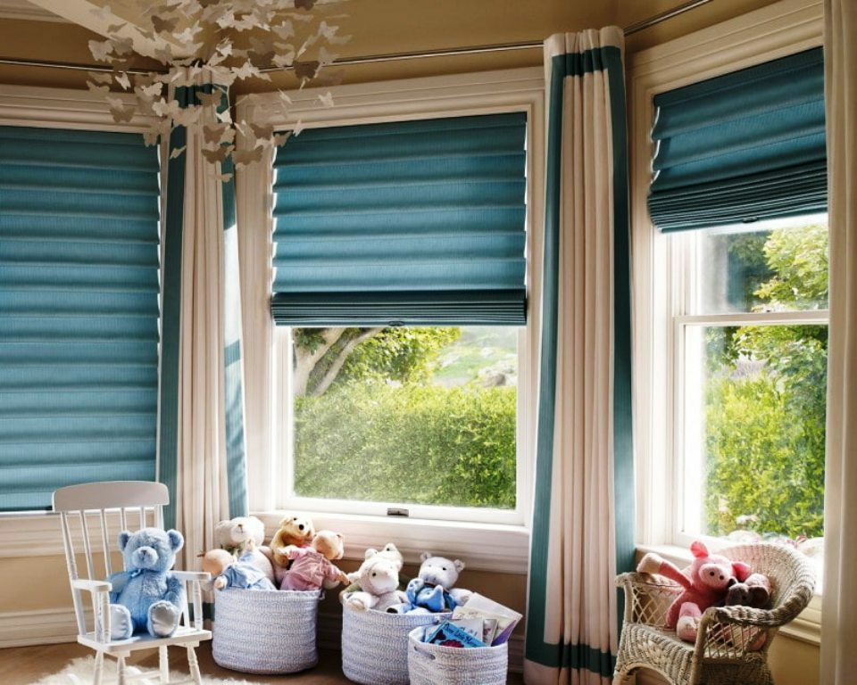double curtains and roman blinds