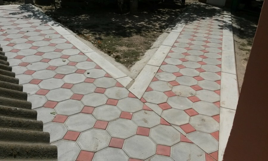 Walkway to the house with octagonal tiles
