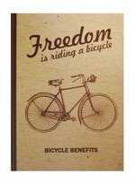 Freiheit fährt mit einem Fahrradnotizbuch (Handwerk)