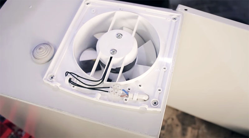 The fan can be fixed with self-tapping screws or hot melt glue