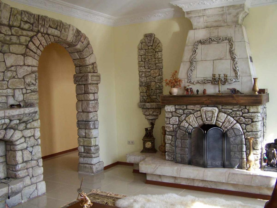 Stone arch in the living room with fireplace