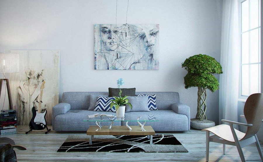 Una pintura discreta sobre el sofá en la sala de estar.