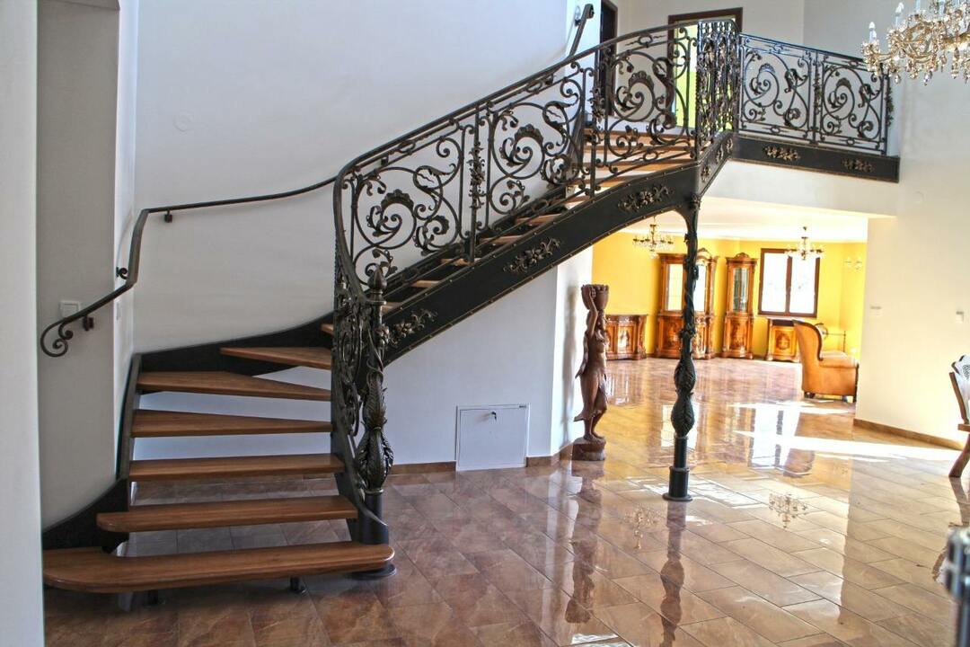 Staircase with wrought iron railing