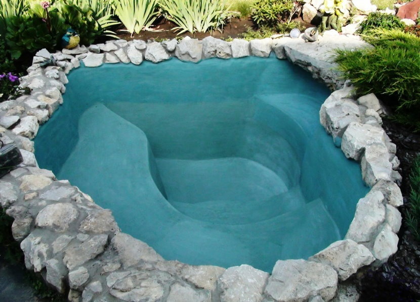 Concrete bowl of a small reservoir in the country