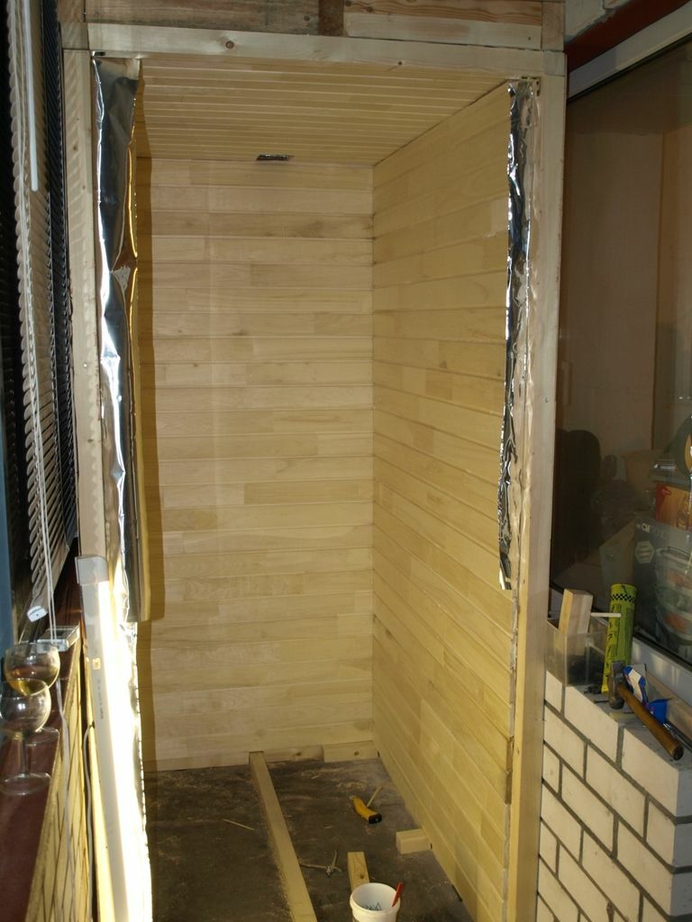 Pine lining as a wall decoration for a balcony sauna