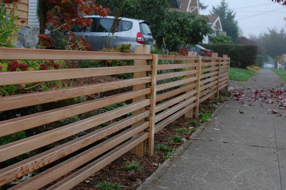 Decorative fence made of horizontal picket fence