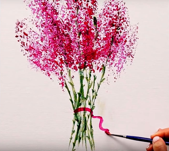 O toque final na criação do bouquet - desenhando a fita com um pincel