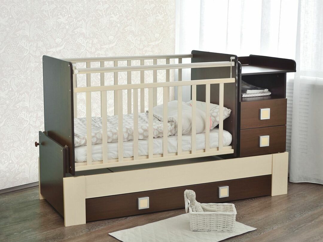 Baby cots with a changing table: with a pendulum, transformer and other types