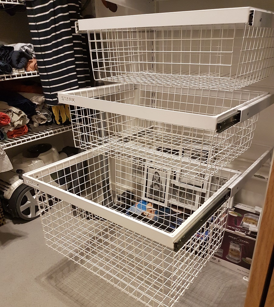 Metal baskets for storing linen in the dressing room