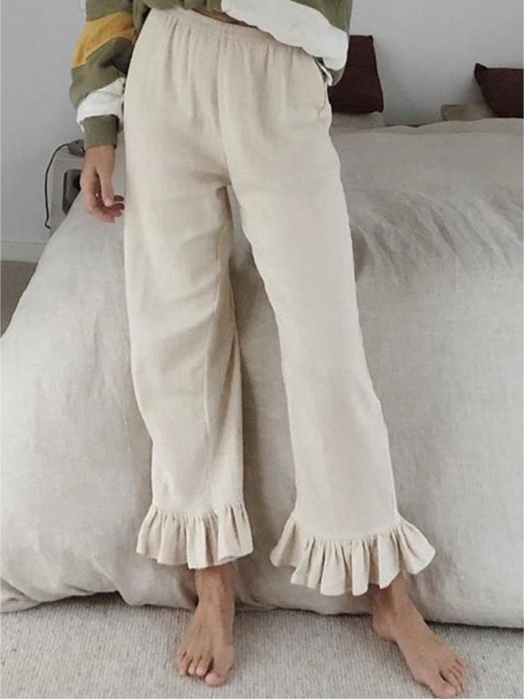 Spodnie flare z falbankami w jednolitym kolorze