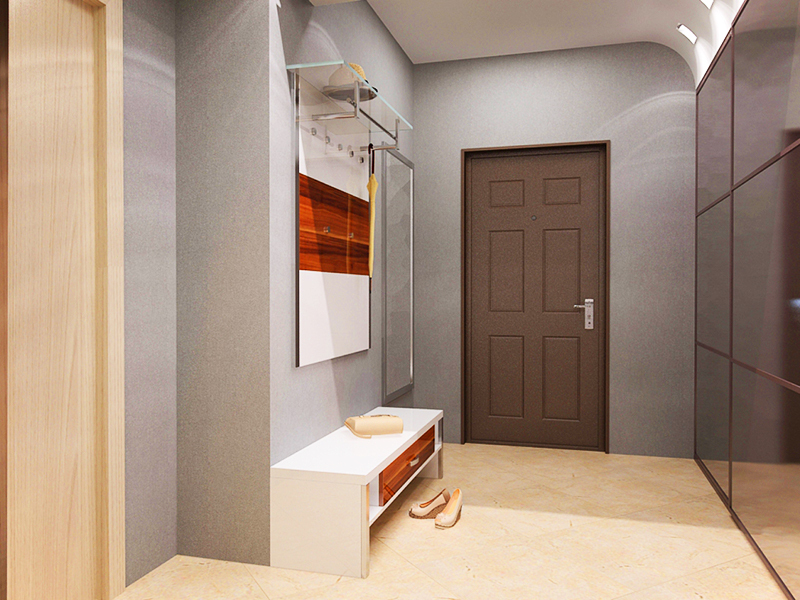Einfache graue Wände und ein funktionaler Kleiderbügel am Eingang sind die beste Lösung für einen kleinen Flur