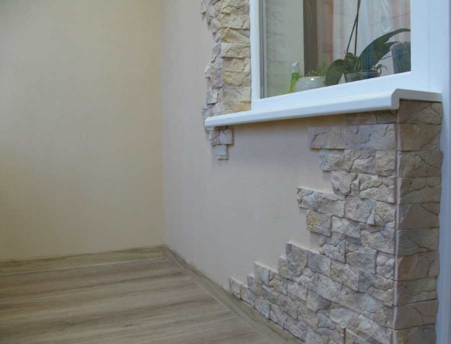 Decoração de parede com pedra artificial na varanda