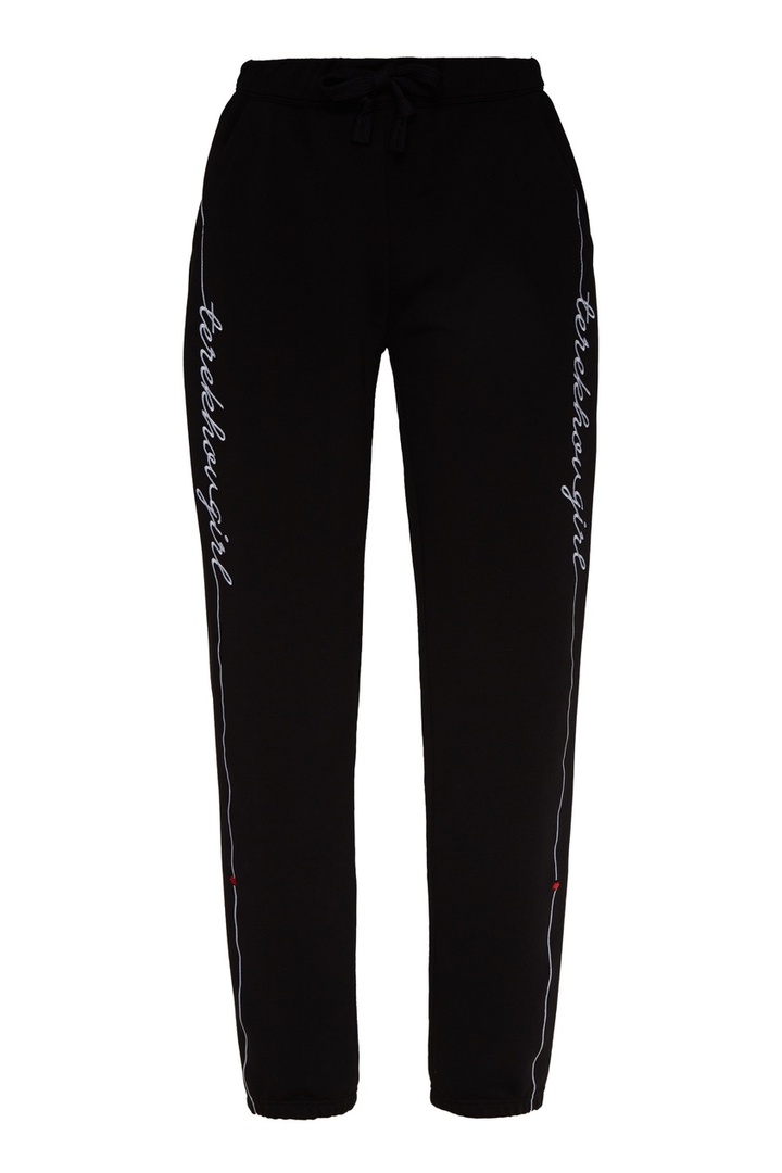 Black trousers with lettering