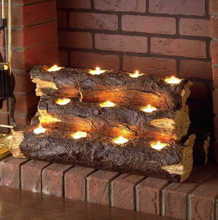 Imitation of real logs in a decorative fireplace insert