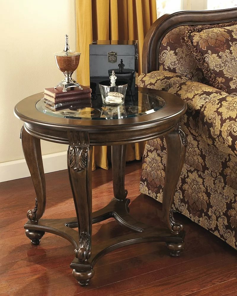 Beautiful coffee table near the armchair in the hall
