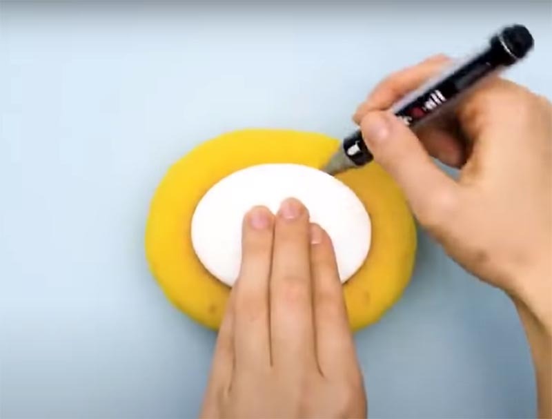 Take a foam sponge and mark the location of the soap bar on it.