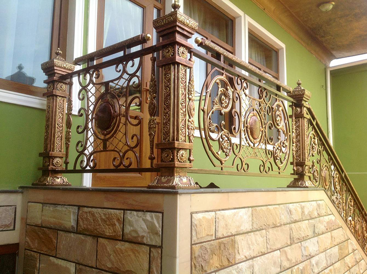 Uniqueness is evident in the details: wrought iron railings inside and outside the house