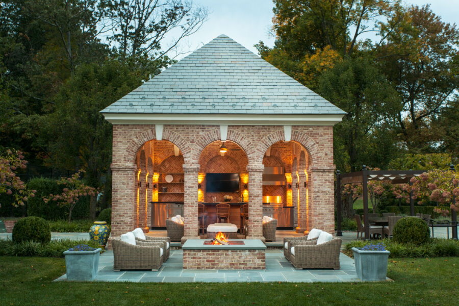 Lighting in a brick gazebo with a TV