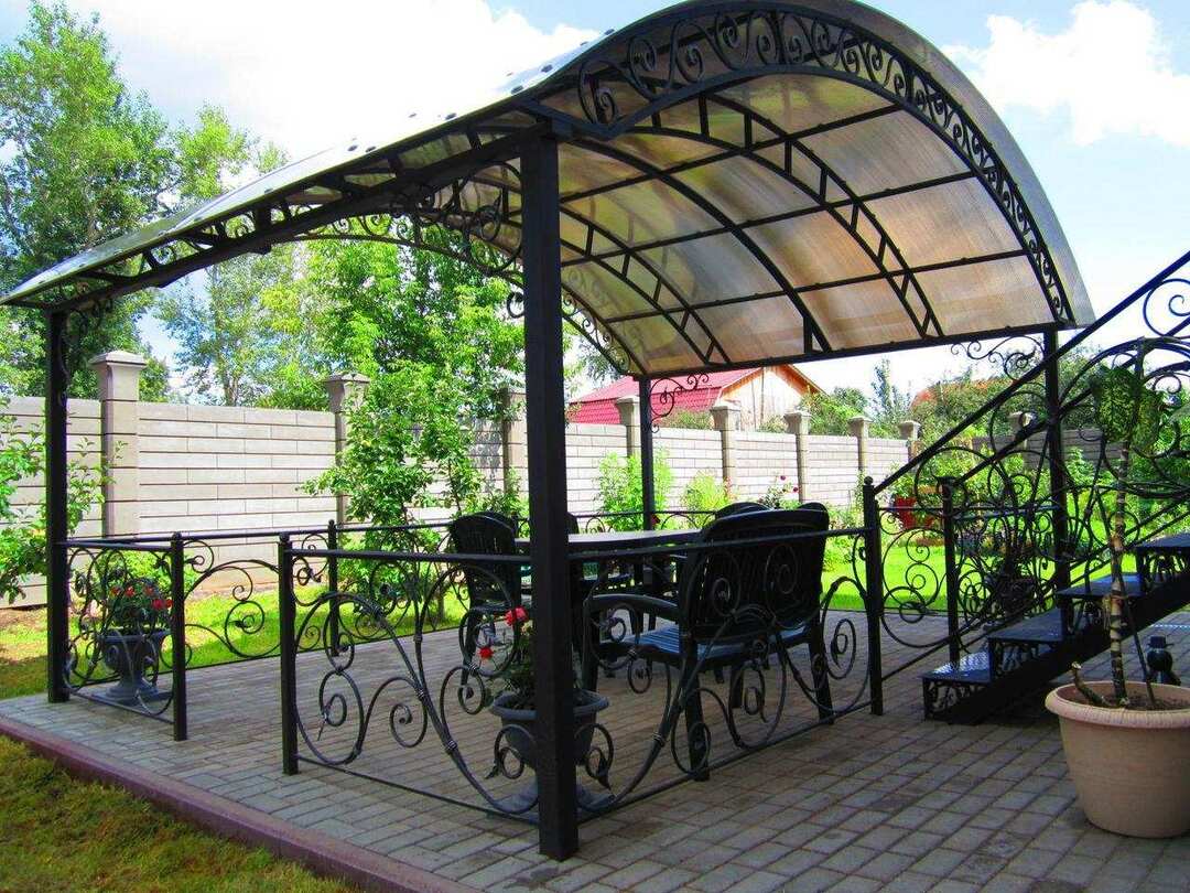 Open gazebo made of metal with a polycarbonate roof