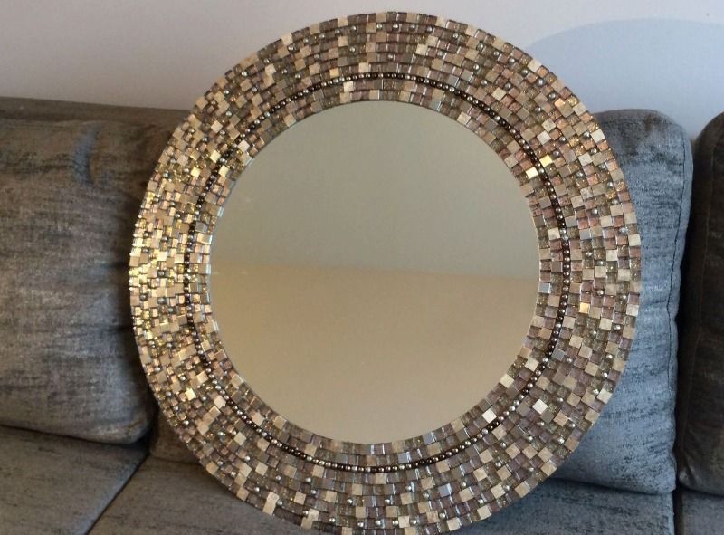 Round mirror with brown frame
