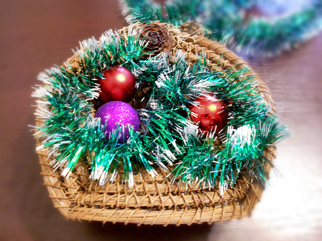Christmas flower arrangements for decoration of tinsel and cones