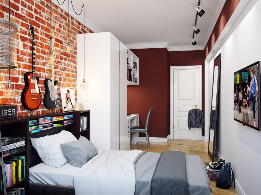 Smalle kamer met een bakstenen muur voor een jongen van 15