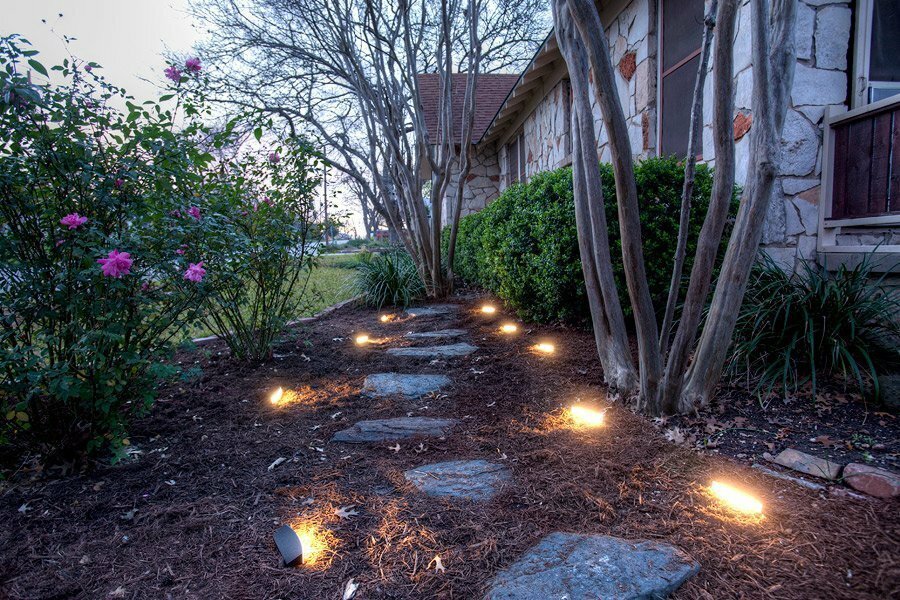 Decorative lights at the edges of the step-by-step path
