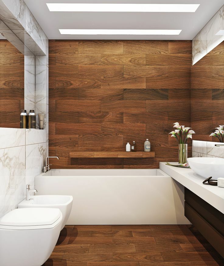 Carrelage effet bois dans une petite salle de bain d'un appartement