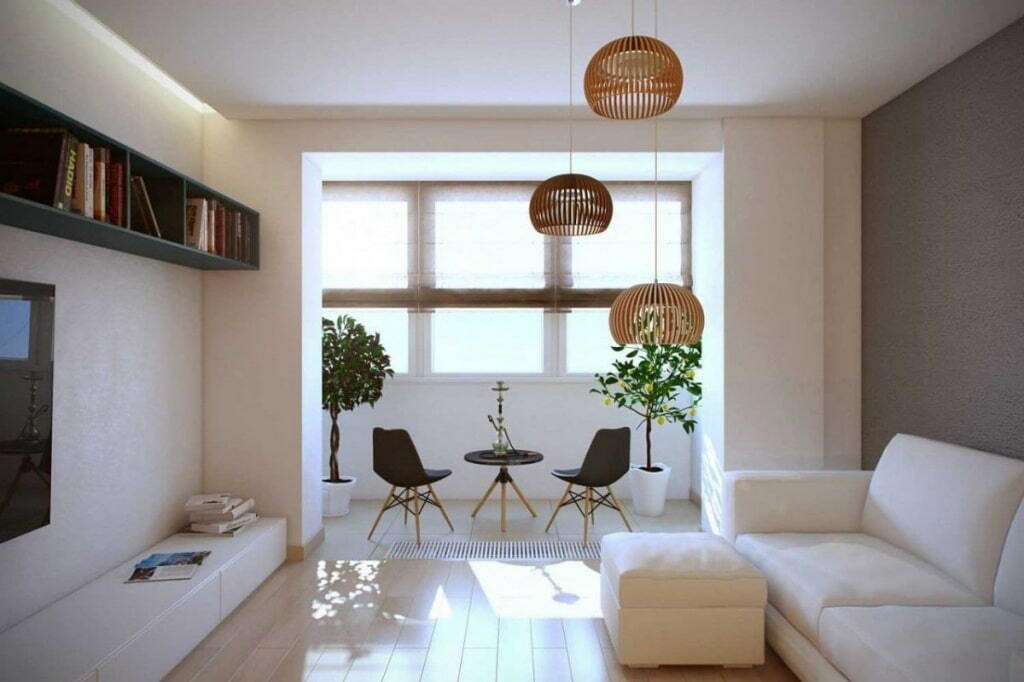 Białe meble w salonie z dołączonym balkonem