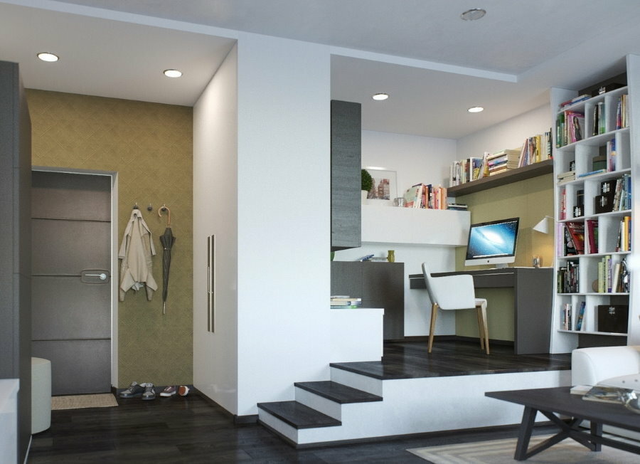 Workplace on the podium in a studio layout apartment