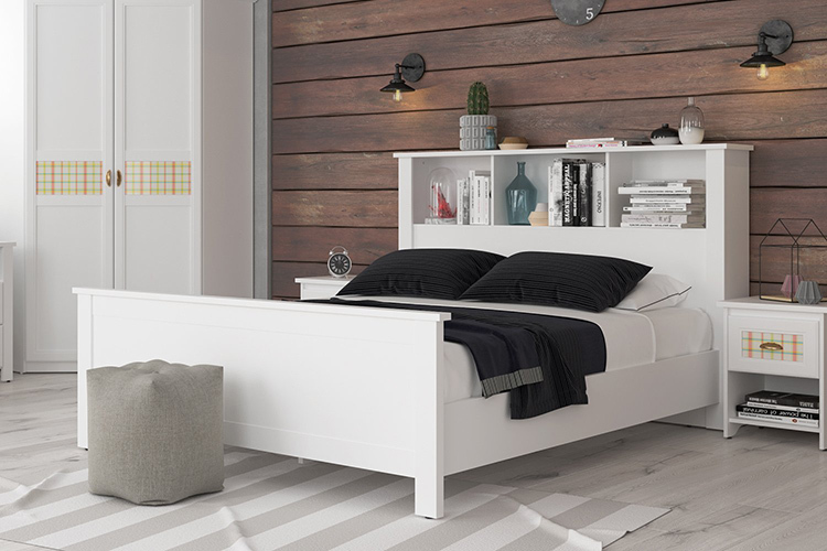 The headboard-chest of drawers takes up relatively little space, but can hold a lot of useful items