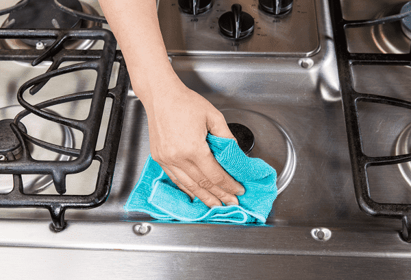How do I clean the gas cooker and why?
