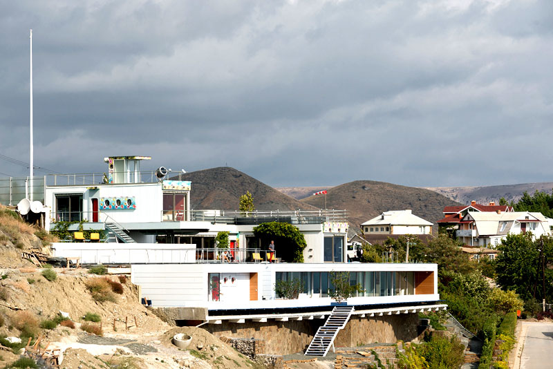 The villa is built on the side of a mountain