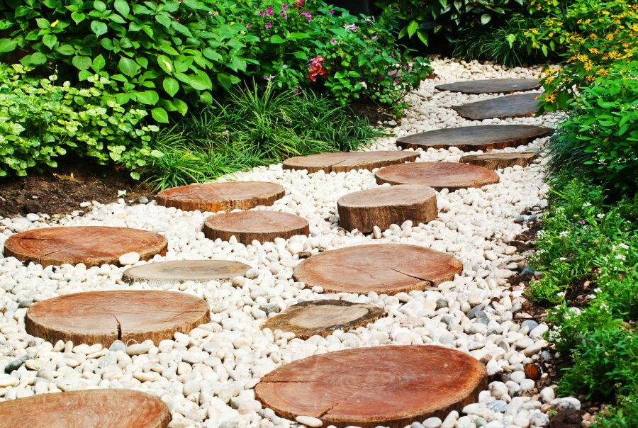 Garden path made of wood and gravel cuts