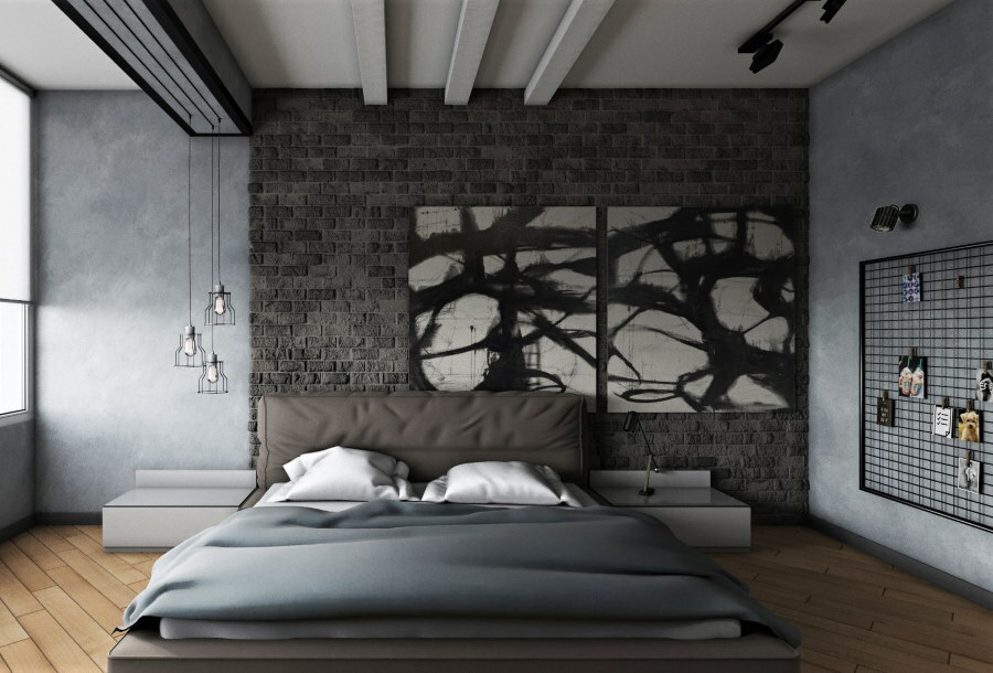 Camera da letto di un uomo in stile loft grigio