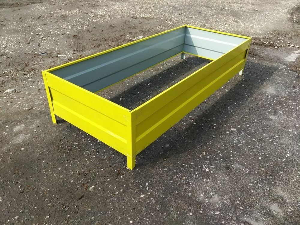 Yellow metal bed with stiffeners