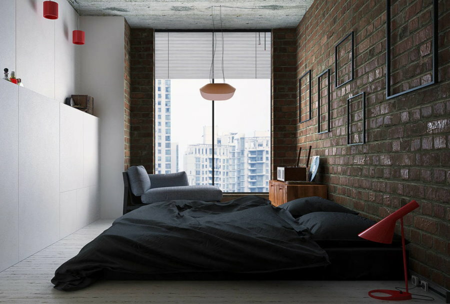 Matratzenbett im Inneren eines Schlafzimmers eines jungen Mannes
