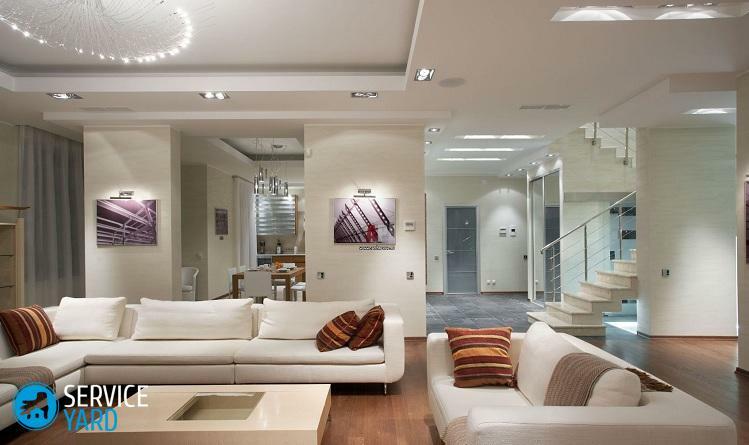 Design av belysning i stuen i en moderne stil