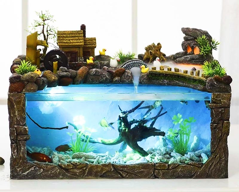 Decorating an aquarium not only inside, but also outside can be very unusual. 