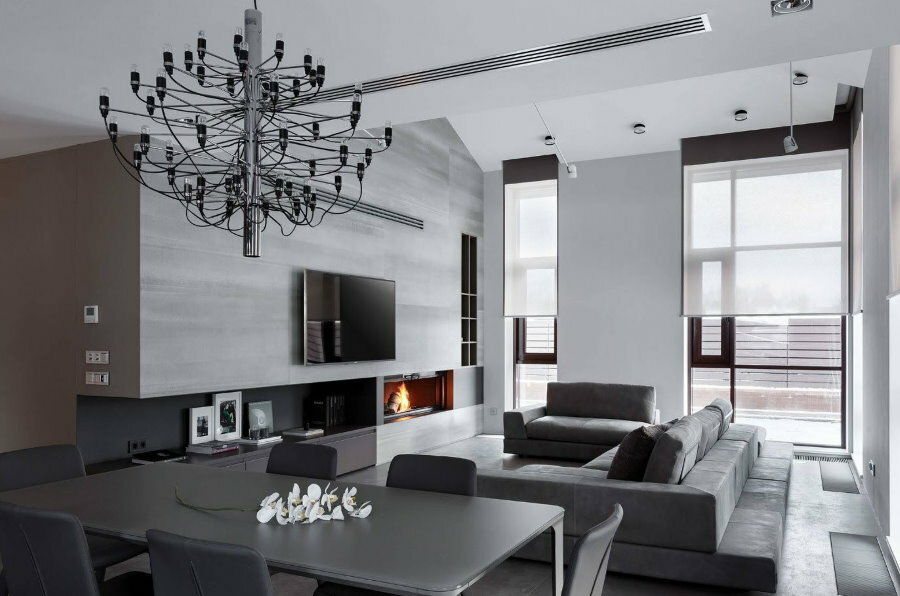 Gray sofa in a hall with white walls