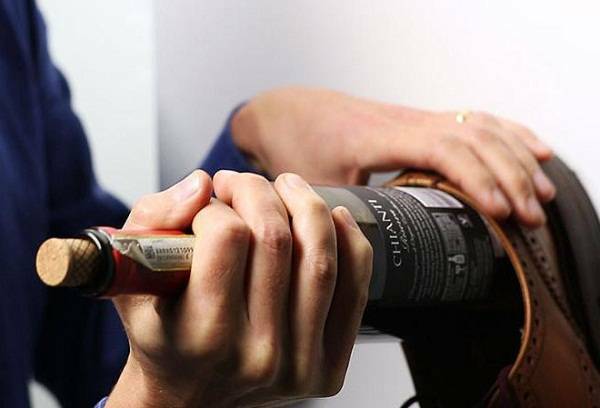 How to open a bottle without a corkscrew - several ways