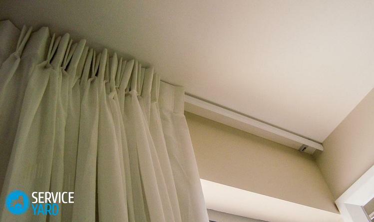 Como pendurar uma haste de cortina de teto para cortinas?
