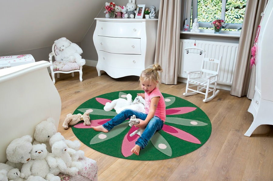 Little girls on a polypropylene rug