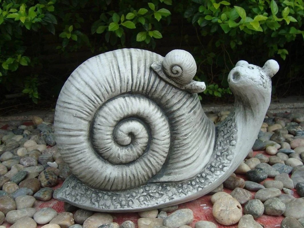 figura de jardín caracol