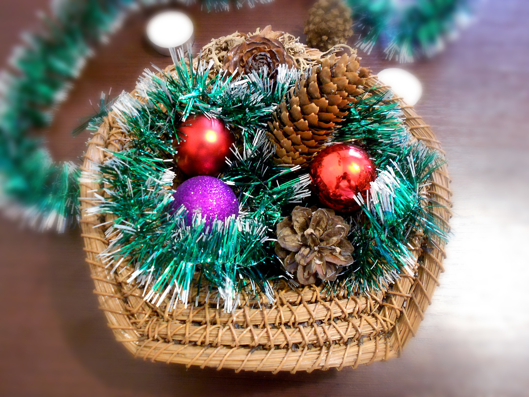 Christmas flower arrangements for decoration of tinsel and cones