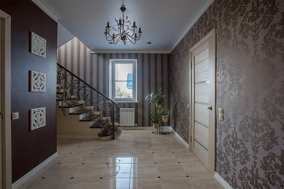 entrance hall in a private house with wallpaper