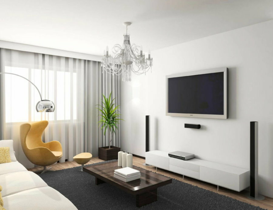 Gul fåtölj i vardagsrum i minimalistisk stil