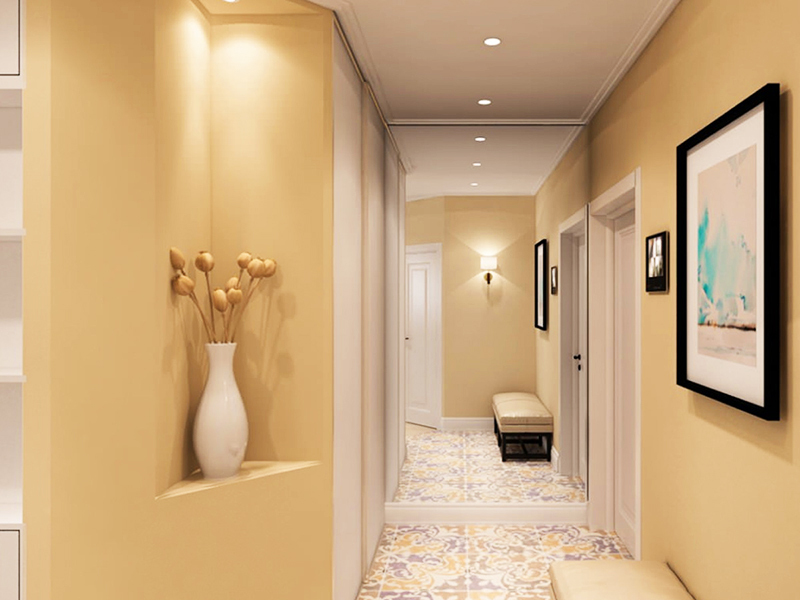 Po celotnem stropu obesite reflektorje in na koncu hodnika, če zadene steno, uporabite običajno stensko svetilko. Pri takšni razsvetljavi pride do učinka podaljšanja hodnika.