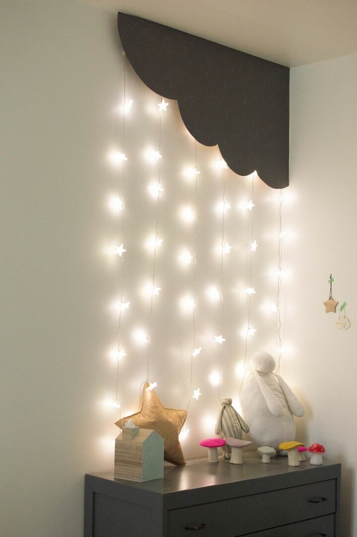 Night light garland on the bedside table with children's toys